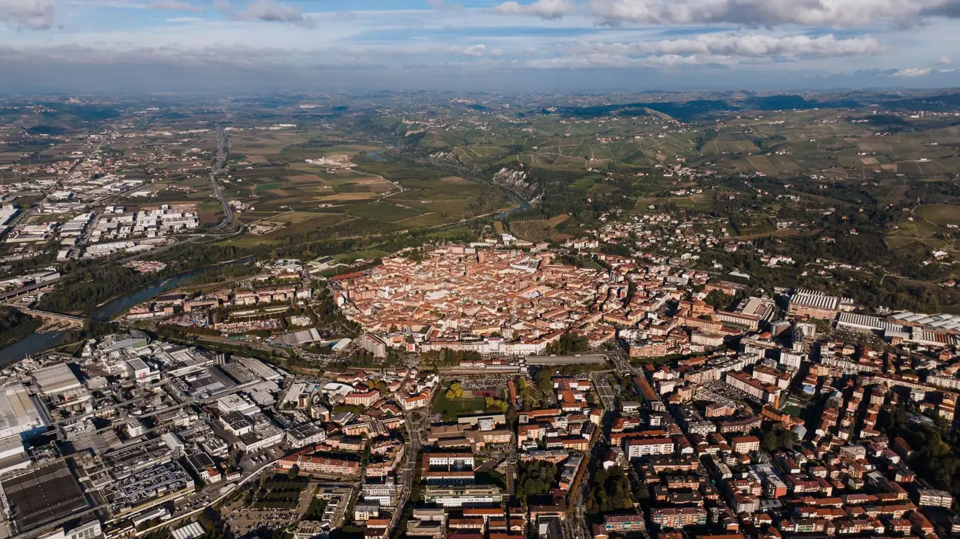 Aerial view of Alba with its old town and the Langhe hills