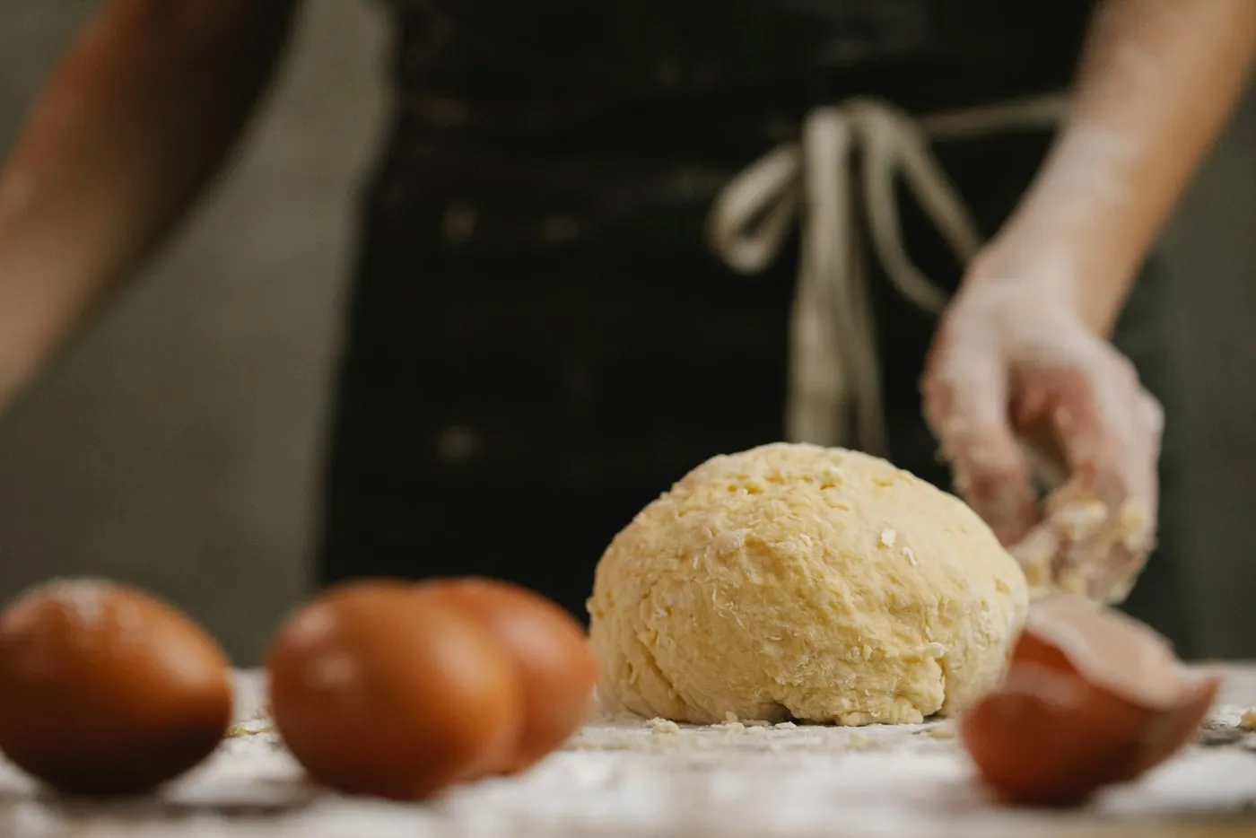 Pasta dough being kneaded
