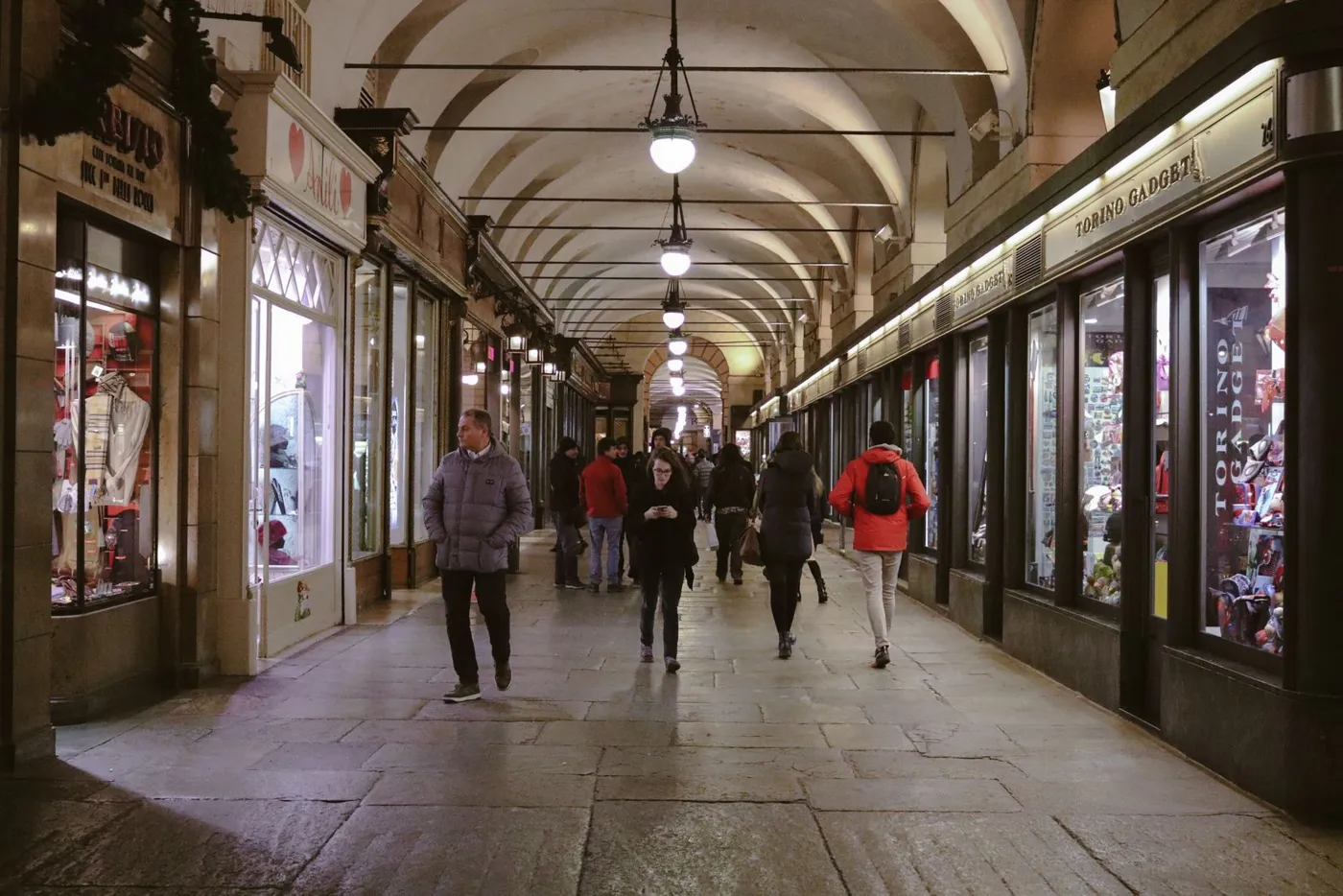 Covered shopping arcade with arches in Turin
