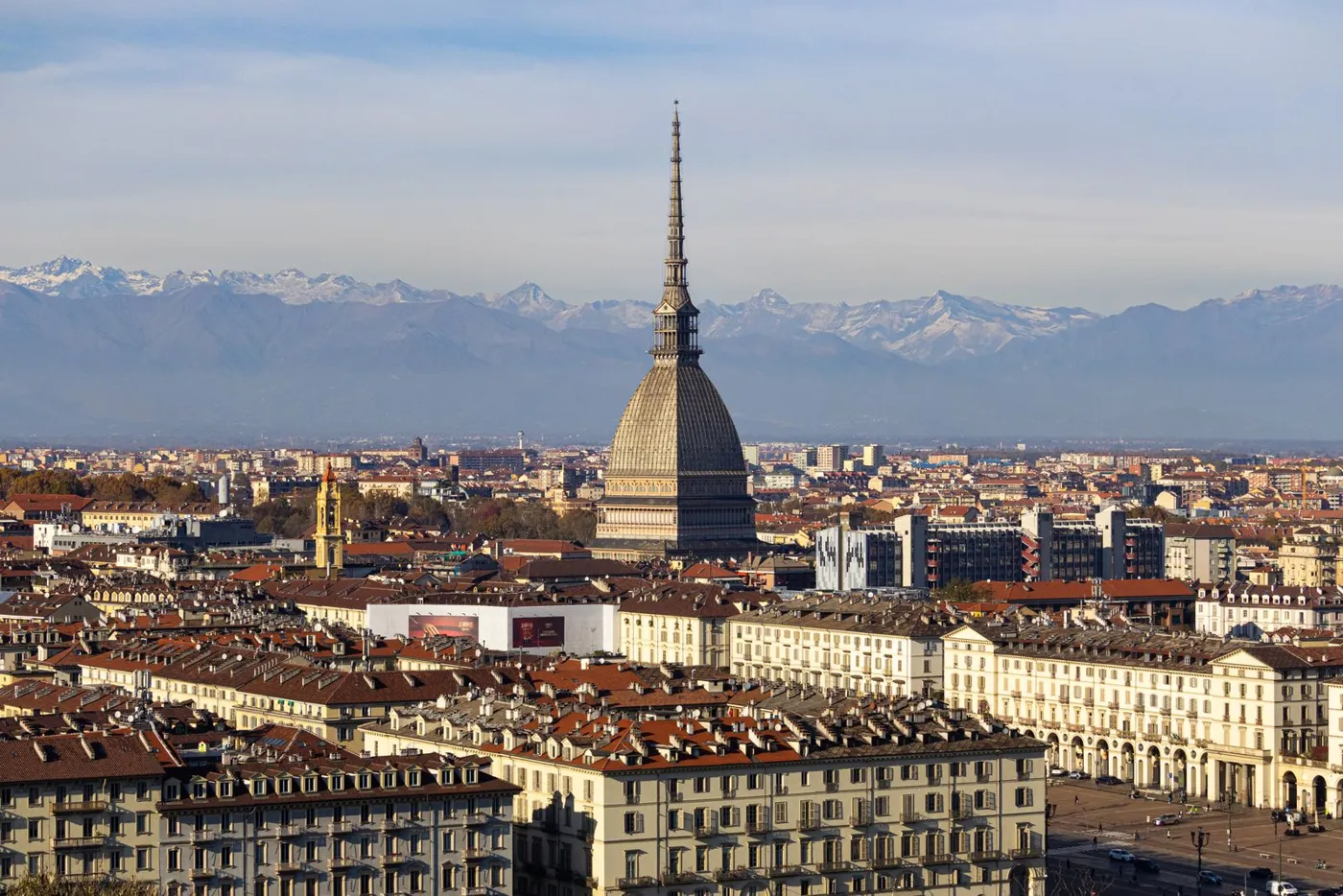Mole Antonelliana in Turin in front of the Alps
