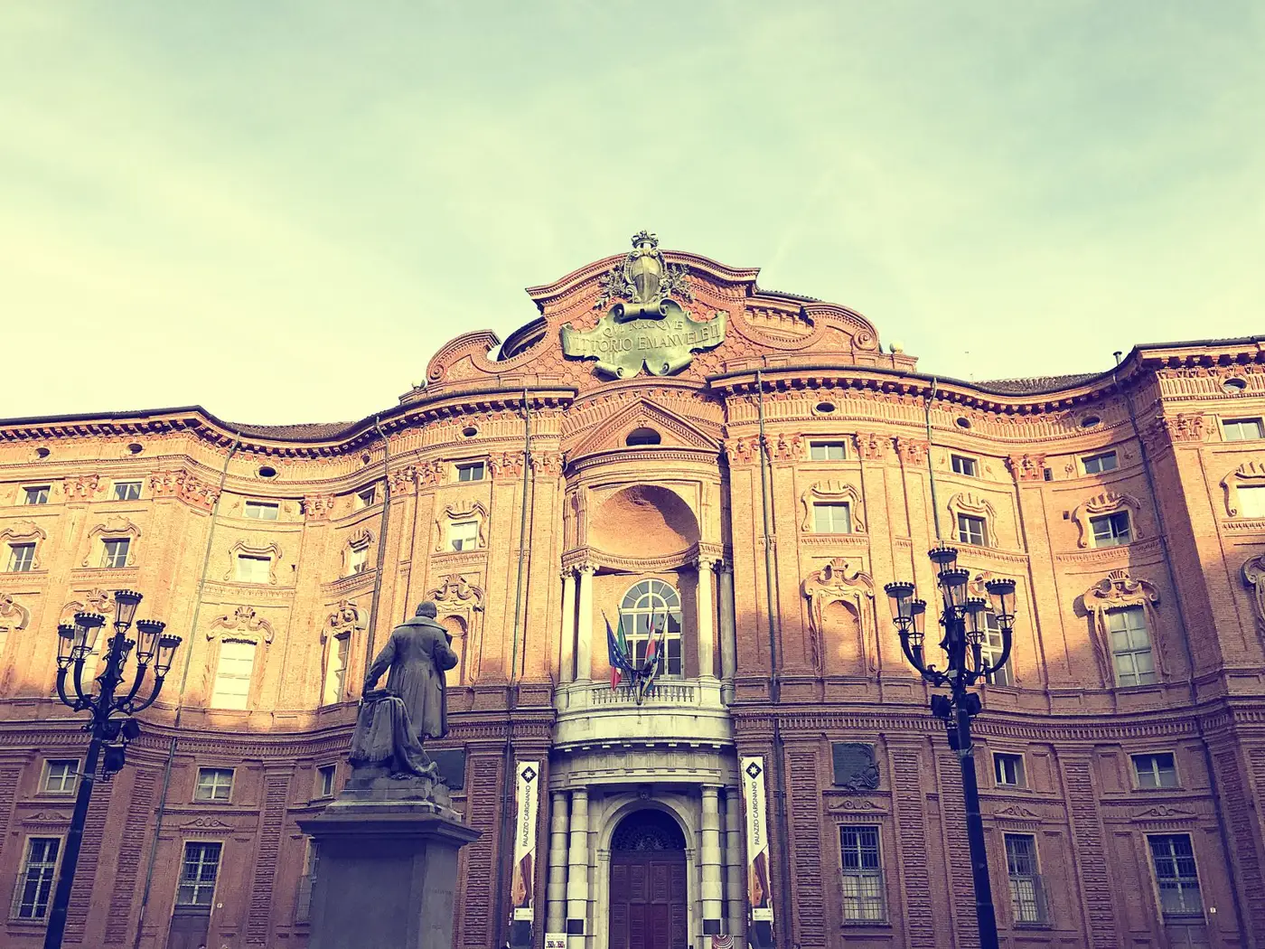 Curved Baroque brick façade of Palazzo Carignano on Piazza Carignano in Turin