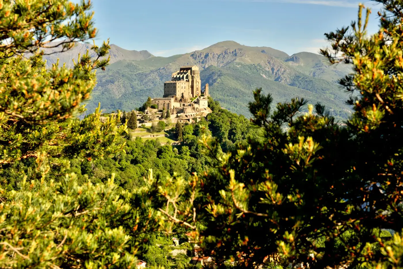Sacra di San Michele on Monte Pirchiriano above the Susa Valley, with the Alps behind